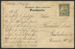 NEW GUINEA - German (Deutsch) New Guinea: 1909 PPC to Germany message headed "Mattupi I." & "7/12/09", view side showing attractive coloured image of "Asa-Kult-Haus in Siar" (native village scene), address side with DNG 5pf Yacht tied by Powell Type 18 Friedrich-Wilhemshafen datestamp.