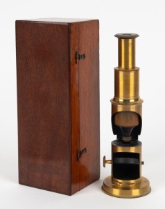 Drum-style brass microscope, 23.5cm at highest setting, in wooden box.