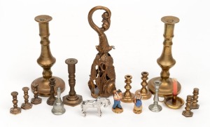 A pair of antique English miniature brass candlesticks together with a collection of dolls house candlesticks, posy holder (glass liner missing), nickel plated horse statue and miniature Dutch figures, (in a Jaeger-LeCoultre clock box),&nbsp;20th century, (19 