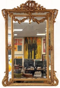 A good quality gilt framed reproduction mirror in the French Baroque style, gadrooned and beaded decoration with chamfered mirror border, 20th century, 163cm x 109cm