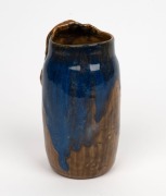 PHILIPPA JAMES pottery vase with applied gum leaf decoration and unusual brown and blue high gloss glaze, incised "Philippa James" with remains of original paper label, 17cm high - 3