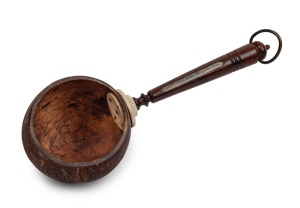 166 · An antique coconut ladle with ivory mount and turned wooden handle, engraved "GOD THE FATHER, GIVER OF LIFE. SHIP, EMMA ROSE" with inset whalebone plaque to handle inscribed "STOLEN FROM SEAN O'REILLY - HIS LADLE", 19th century, ​​​​​​​29.5cm long overall