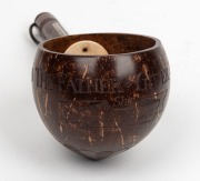 An antique coconut ladle with ivory mount and turned wooden handle, engraved "GOD THE FATHER, GIVER OF LIFE. SHIP, EMMA ROSE" with inset whalebone plaque to handle inscribed "STOLEN FROM SEAN O'REILLY - HIS LADLE", 19th century, ​​​​​​​29.5cm long overall - 2