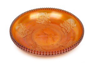 386 · A marigold carnival glass kookaburra and waratah fruit bowl, ​​​​​​​28.5cm diameter