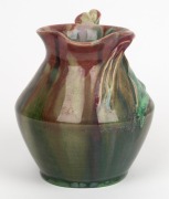 REMUED&nbsp;pink and green glazed pottery jug with blue highlights, decorated with applied gumnuts and leaves, incised "Remued 192", 16cm high - 2