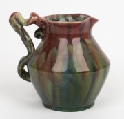 REMUED&nbsp;pink and green glazed pottery jug with blue highlights, decorated with applied gumnuts and leaves, incised "Remued 192", 16cm high - 3