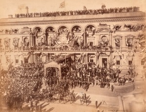 FEDERATION - TREASURY BUILDING (Spring Street Melbourne), impressive albumen print on original card showing a very enthusiastic crowd gathered for the procession of Duke and Duchess of Cornwall and York. Note the number of people assembled on the roof!. 2