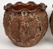 A pair of Australian earthenware salt glazed jardinieres with ruffled rims, sgraffito textured ground and applied kookaburras and flower heads, circa 1920, 26cm high, 26cm diameter - 3
