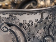 An antique presentation sterling silver two handled trophy cup with repousse&nbsp;decoration and engraved dedication "Special Prize For Red Wine, The Gift Of The Daily News, Awarded To, Otto Fring Esq.r, At The Castlemaine Grain & Wine Show, March 17th 1868",&nbsp; - 4