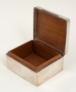 An Australian sterling silver presentation cigarette box engraved to the lid "To Dr C.S. Graham, in token of esteem from the staff of the Royal North Shore Hospital, 31.3.37". Dr Colin Spencer Graham, M.B Ch.M, received his certificate 4948 on 27th Septem - 2