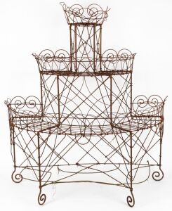 An antique wirework&nbsp;three tier demi lune plant stand, 19th/20th century, ​​​​​​​121cm high, 103cm wide, 56cm deep