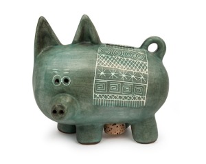 347 · GUS McLAREN rare pottery pig money box with green glaze and sgraffito decoration, incised "McLaren", 17cm high, 19cm wide