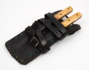 A pair of antique leaning knives with whalebone handles in a user made leather twin pouch, Western Australian origin, 19th/20th century - 2