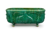 JOHN CAMPBELL green glaze pottery flower trough with bird decoration and claw feet, incised "John Campbell, Tasmania", 20cm high, 46cm wide