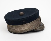 CONVICT DEPARTMENT Officer's cap with original circular badge, navy blue wool with silver thread trim and band, circa 1840s. Note: this is the only example with a silver finished hat badge known to our rooms. Rare. - 3