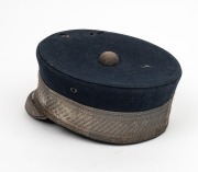 CONVICT DEPARTMENT Officer's cap with original circular badge, navy blue wool with silver thread trim and band, circa 1840s. Note: this is the only example with a silver finished hat badge known to our rooms. Rare. - 4