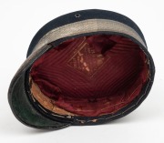 CONVICT DEPARTMENT Officer's cap with original circular badge, navy blue wool with silver thread trim and band, circa 1840s. Note: this is the only example with a silver finished hat badge known to our rooms. Rare. - 5