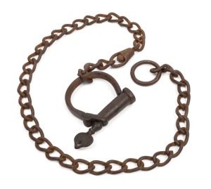 Convict era handcuff on lead chain, early 19th century. Note: original early shaped key. 89cm long.
