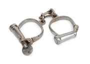 HIATT&nbsp;convict handcuffs with screw-key and original nickel finish, engraved "HIATT&nbsp;SPF 1329". Note: very small size. ​​​​​​​24cm wide