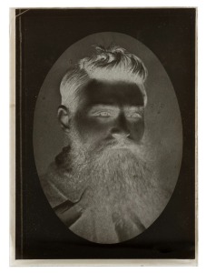 147 · NED KELLY. Box of 12 glass plate negatives, including photographs of NED KELLY and of the Victorian Police Force officers connected with the pursuit of the KELLY GANG, of note DISNEY, L. P. BOOKEY, SLADE, S.S. FURNELL, etc. [Melbourne, circa 1890s]