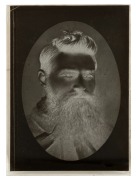 NED KELLY. Box of 12 glass plate negatives, including photographs of NED KELLY and of the Victorian Police Force officers connected with the pursuit of the KELLY GANG, of note DISNEY, L. P. BOOKEY, SLADE, S.S. FURNELL, etc. [Melbourne, circa 1890s]