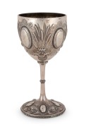 WILLIAM EDWARDS (attributed) of Melbourne, antique Australian silver goblet with repousse waterlily and bulrush decoration, 19th century, stamped "STERLING SILVER", 19cm high, 284 grams total (including weighted base)