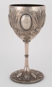 WILLIAM EDWARDS (attributed) of Melbourne, antique Australian silver goblet with repousse waterlily and bulrush decoration, 19th century, stamped "STERLING SILVER", 19cm high, 284 grams total (including weighted base) - 2