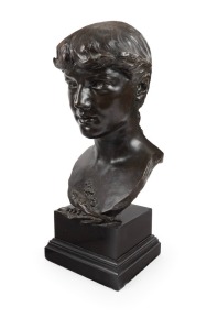 OLIN LEVI WARNER (American, 1844-1896), cast bronze bust of a young lady, mounted on square form plinth, signed "O.L. Warner, 1882", 48.5cm high overall