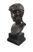 OLIN LEVI WARNER (American, 1844-1896), cast bronze bust of a young lady, mounted on square form plinth, signed "O.L. Warner, 1882", 48.5cm high overall