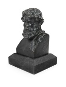 OLIN LEVI WARNER (American, 1844-1896), cast bronze bust of a man, sitting on a black marble square form plinth, signed "To My Friend Daniel Cottier Olin. L. Warner, N.Y. 1878", 27cm high overall