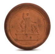CUMBERLAND POTTERY, c1888. circular terracotta plaque made by Liebentritt & Son, 10.5cm in diameter.