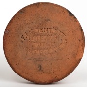 CUMBERLAND POTTERY, c1888. circular terracotta plaque made by Liebentritt & Son, 10.5cm in diameter. - 2