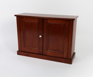 A vintage Australian cedar and pine two door desktop cabinet, 20th century, 54cm high, 74cm wide, 25cm deep