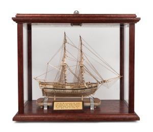 165 · A fine quality antique Napoleonic prisoner of war whalebone model ship, 18th/19th century, housed in a later timber and glass display cabinet from the late 20th century. Accompanied by a 1990 purchase receipt from Trevor Philip & Sons of London, dated 1990 for £4,400. ​​​​​​​28cm high, 33cm long, the case 38cm high, 43cm wide, 22cm deep