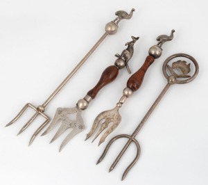Four Australiana silver plated bread forks with emus, kangaroo, boomerang and Australian map, two with fiddleback blackwood handles, by Stoke & Sons and Stewart Dawson, 19th/20th century, the largest 26cm long