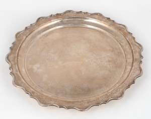 An Australian silver serving tray, early 20th century, stamped "ANGUS & COOTE, RUNDLE" with numerous pictorial marks, 36cm wide, 1,338 grams