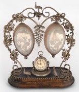 An antique Australiana&nbsp;mantle clock with silver plated mounts adorned with kangaroo, emus, ferns and flowers, mounted on a timber base, decorated with two carved emu eggs, circa 1900, 35cm high. PROVENANCE:&nbsp;The Professor Stephen Bartos Collection, Canber