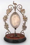 An antique Australian silver plated emu egg ornament carved with lyrebird in bush landscape, adorned with kangaroo and emu finial, late 19th century, ​​​​​​​30.5cm high