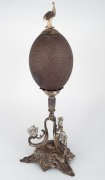 An antique emu egg ornament with silver plated mounts adorned with emu finial and later applied koalas, circa 1900, ​​​​​​​34cm high - 2