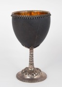 An antique emu egg goblet, mounted in English sterling silver with repousse decoration and original gold wash finish to the interior, made by John Kilpatrick of London, circa 1870, 15.5cm high PROVENANCE:&nbsp;The Professor Stephen Bartos Collection, Canberra