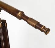 A brass telescope on timber tripod, 96cm long. - 2