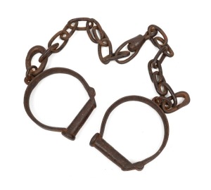 Convict leg irons, 19th century, 98cm long.