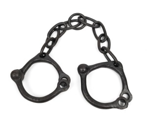 Convict leg irons with "B.O." broad arrow stamp, 19th century, 70cm wide.