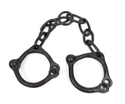 Convict leg irons with "B.O." broad arrow stamp, 19th century, 70cm wide.