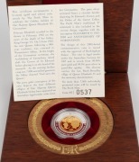 2003 $20 bi-metal Golden Jubilee of Coronation 1953-2003 silver and pure gold &frac12;oz coin which depicts the four effigies of Queen Elizabeth that had appeared on Australian coins. Attractively presented in a felt-lined timber case, with Certificate of Authen - 2