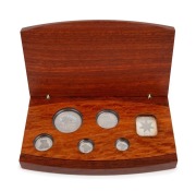 Five-piece platinum Koala proof Set for 2003,&nbsp;Australian Stories - The Arts commemorative issue, $5, $15, $25, $50, and $100 Dollars, all Gem Proofs in the original wooden case; numbered 028 of 200.