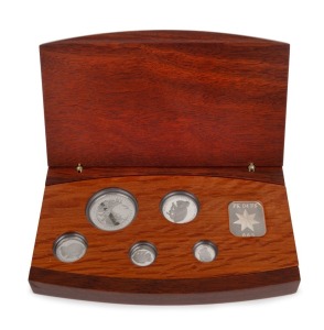 Five-piece platinum Koala proof Set for 2004, Australian Stories - Sports commemorative issue, $5, $15, $25, $50, and $100 Dollars, all Gem Proofs in the original wooden case; numbered 065 of 200.
