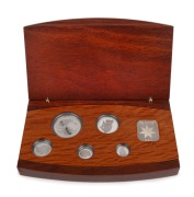 Five-piece platinum Koala proof Set for 2004,&nbsp;Australian Stories - Sports commemorative issue, $5, $15, $25, $50, and $100 Dollars, all Gem Proofs in the original wooden case; numbered 065 of 200.