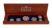 Five-piece platinum Koala proof Set for 1995,&nbsp;the $5, $15, $25, $50, and $100 Dollars, all Gem Proofs in the original wooden case; numbered 063 of 200.