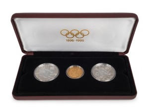 AUSTRIA: 1896-1996 Olympic Centennial Coin Programme - Series 4. 1995 cased proof set of 3 comprising of gold 1,000sch Zeus, silver 200sch Gymnast and 200sch Slalom Skier. With the 3 certificates of authenticity.